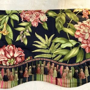 Waverly scalloped valance with fringe detail. Black background